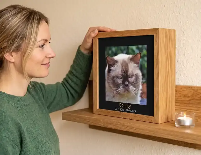 Personalized cat urn made of solid oak.